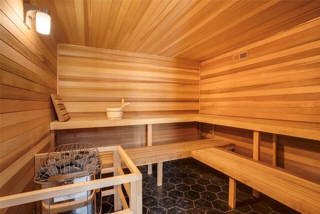 1920 Ski Time Square Dr Unit 402, Steamboat Springs, CO 80487 - sauna with tile patterned floors, wooden ceiling, and wooden walls