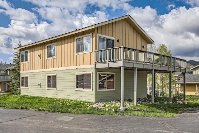 14 Crystal Cv Unit C14, Dillon, CO 80435 - view of home's exterior with board and batten siding and a wooden deck