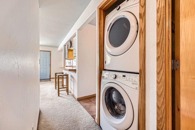 14 Crystal Cv Unit C14, Dillon, CO 80435 - washroom with stacked washer / dryer and light carpet