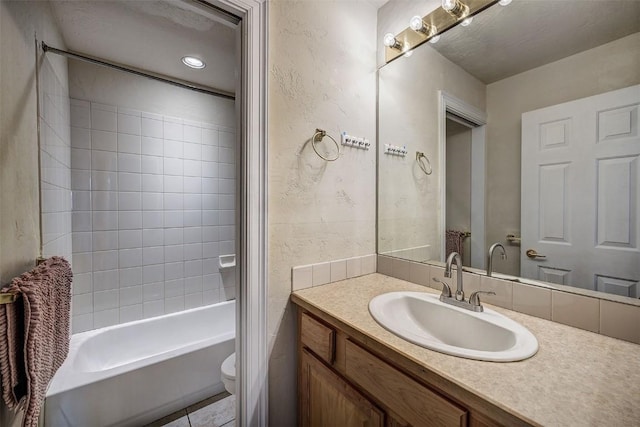 856 Kingdom Dr Unit 856, Breckenridge, CO 80424 - full bathroom featuring vanity, toilet, tile patterned flooring, and washtub / shower combination