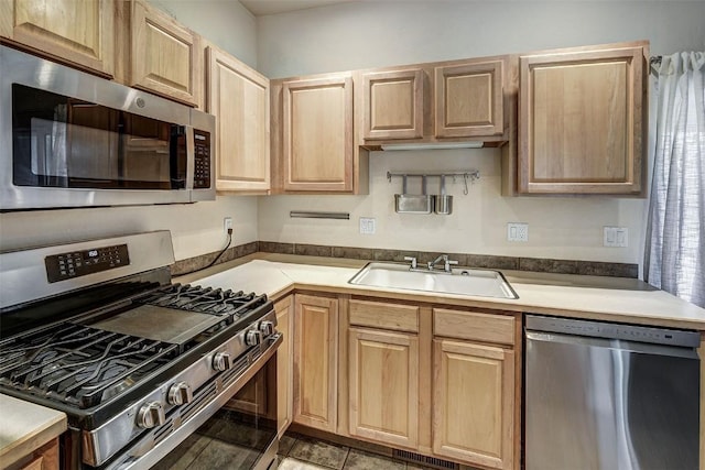 856 Kingdom Dr Unit 856, Breckenridge, CO 80424 - kitchen with stainless steel appliances, a sink, and light brown cabinets
