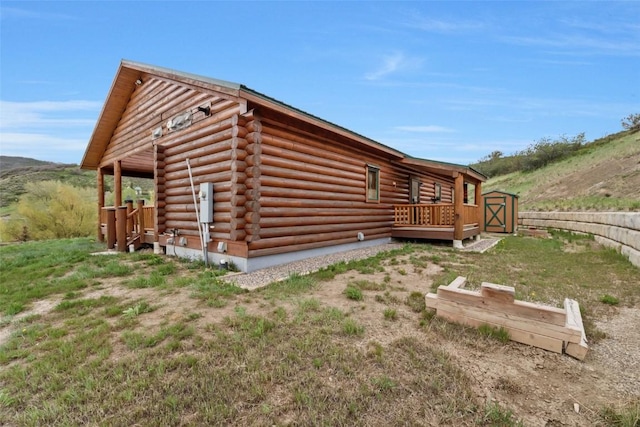 126 E 1st St, Oak Creek, CO 80467 - view of home's exterior featuring log exterior