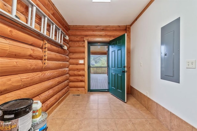 126 E 1st St, Oak Creek, CO 80467 - entrance foyer with electric panel, log walls, and light tile patterned flooring