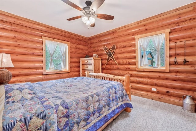 126 E 1st St, Oak Creek, CO 80467 - carpeted bedroom with multiple windows and a ceiling fan