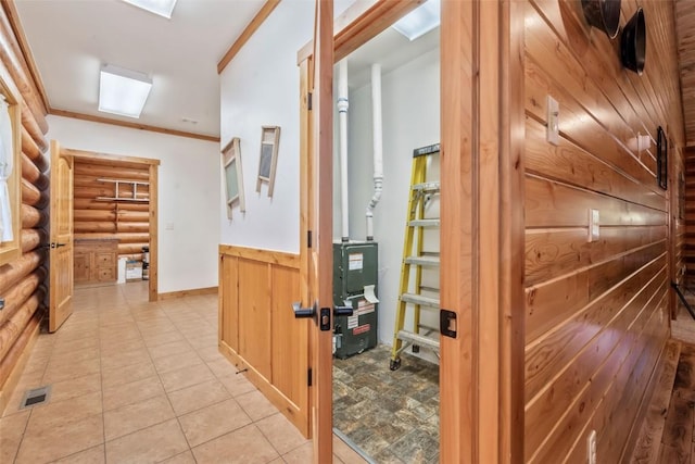 126 E 1st St, Oak Creek, CO 80467 - corridor with wainscoting, log walls, ornamental molding, and wooden walls