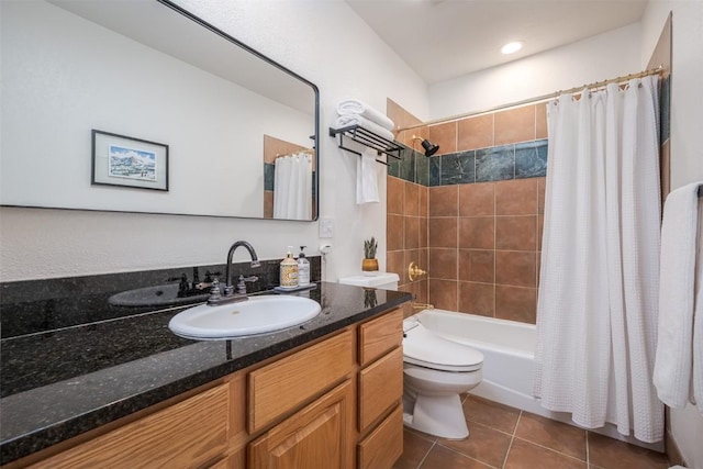 1485 Mustang Run Unit A, Steamboat Springs, CO 80487 - full bath with tile patterned flooring, toilet, vanity, and shower / bathtub combination with curtain