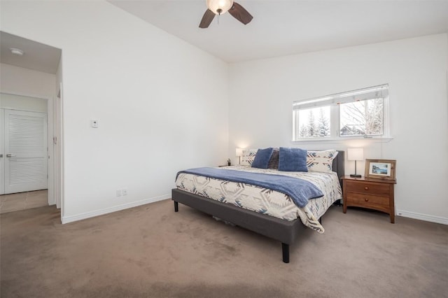 bedroom with baseboards, a ceiling fan, and carpet flooring