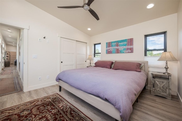 30510 Ormega Way, Oak Creek, CO 80467 - bedroom with light wood-style flooring, multiple windows, lofted ceiling, a closet, and recessed lighting