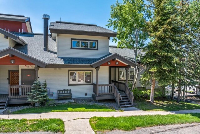 1724 Ski Time Square Dr Unit R5, Steamboat Springs, CO 80487 - view of front facade with roof with shingles and covered porch