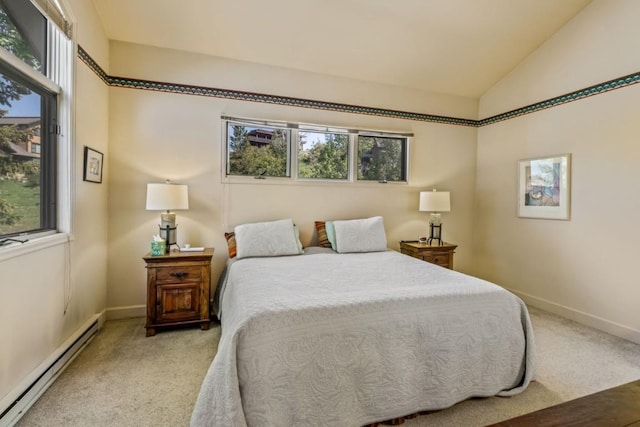 1724 Ski Time Square Dr Unit R5, Steamboat Springs, CO 80487 - bedroom with baseboard heating, carpet, baseboards, and vaulted ceiling