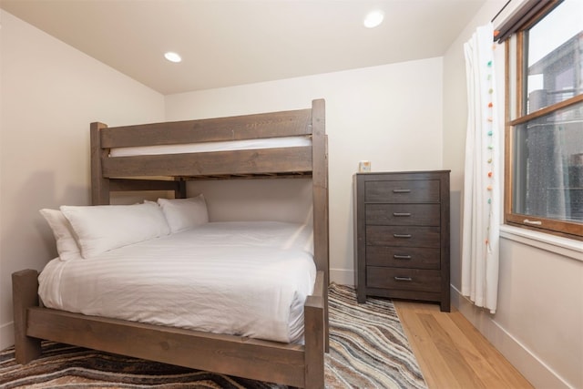 1080 Blue River Pkwy Unit 203, Silverthorne, CO 80498 - bedroom featuring recessed lighting, light wood-style floors, and baseboards