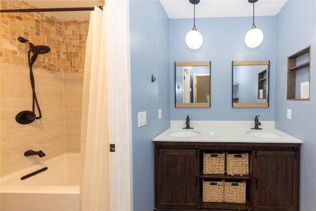 6950 Ryan Gulch Rd Unit 6950, Silverthorne, CO 80498 - full bathroom featuring shower / bathtub combination with curtain and double vanity