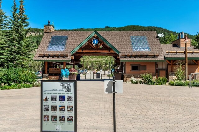 140 Ida Belle Dr Unit 8178, Keystone, CO 80435 - view of front of house featuring a chimney