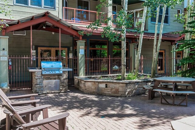 140 Ida Belle Dr Unit 8178, Keystone, CO 80435 - view of patio / terrace featuring outdoor dining space, a balcony, exterior kitchen, and area for grilling