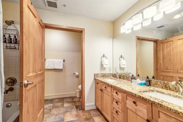 140 Ida Belle Dr Unit 8178, Keystone, CO 80435 - bathroom featuring visible vents, toilet, and a sink