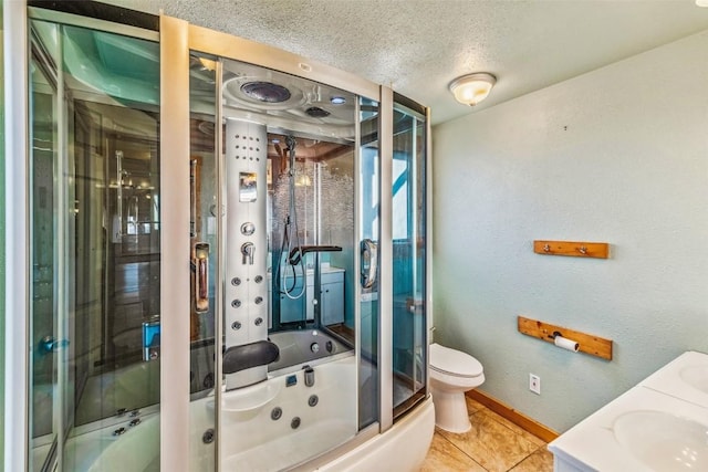 259 Falcon Rd, Como, CO 80432 - full bath featuring a whirlpool tub, toilet, a textured ceiling, tile patterned flooring, and a shower with shower door