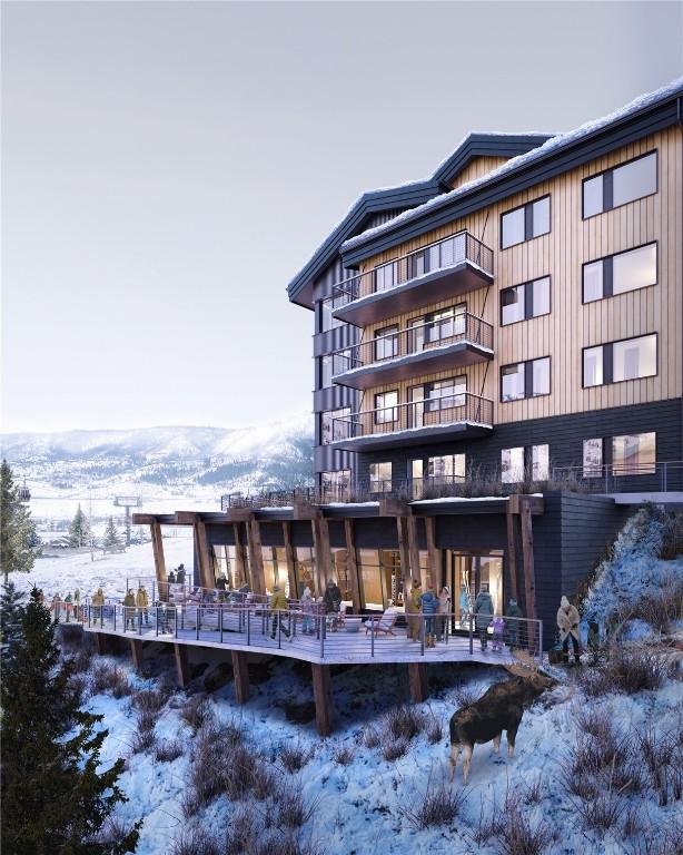 1550 Amble Dr Unit 402, Steamboat Springs, CO 80487 - snow covered property with a mountain view