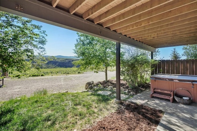 297 County Road 1012, Silverthorne, CO 80498 - view of yard with a hot tub, a mountain view, and a patio area