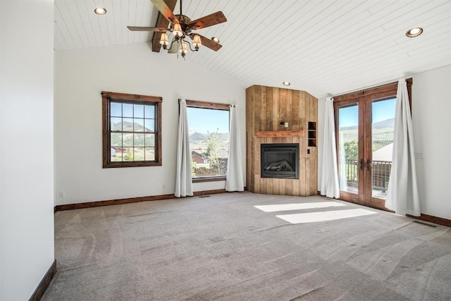 297 County Road 1012, Silverthorne, CO 80498 - unfurnished living room with french doors, plenty of natural light, vaulted ceiling, carpet flooring, and recessed lighting