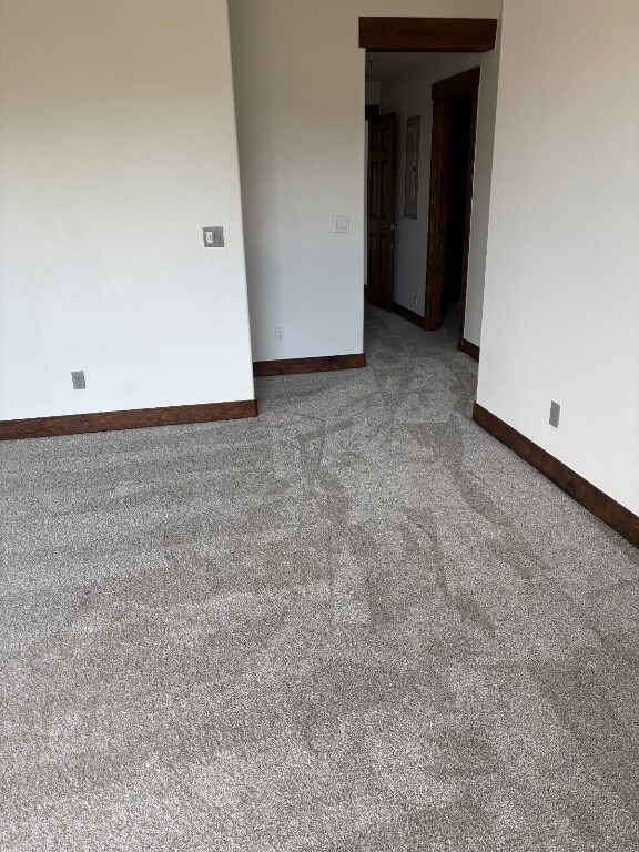 297 County Road 1012, Silverthorne, CO 80498 - carpeted spare room featuring baseboards and electric panel