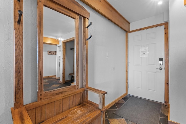foyer entrance with baseboards