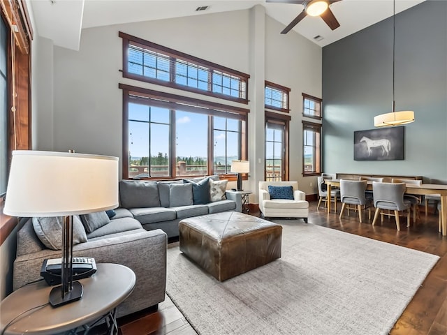 1521 Ski Hill Rd Unit 8424, Breckenridge, CO 80424 - living room featuring high vaulted ceiling, plenty of natural light, a ceiling fan, and wood finished floors