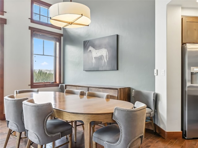 1521 Ski Hill Rd Unit 8424, Breckenridge, CO 80424 - dining area featuring wood finished floors and baseboards