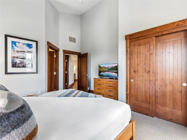 1521 Ski Hill Rd Unit 8424, Breckenridge, CO 80424 - carpeted bedroom featuring a high ceiling