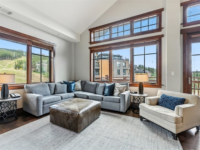 1521 Ski Hill Rd Unit 8424, Breckenridge, CO 80424 - living room with wood finished floors and high vaulted ceiling