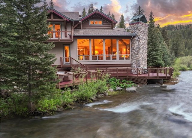 60 Trafalgar Dr, Breckenridge, CO 80424 - rear view of property with a deck, a balcony, and stucco siding