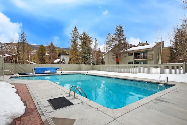 1937 Soda Ridge Rd Unit 1138, Keystone, CO 80435 - view of swimming pool featuring a fenced backyard, a patio area, and a mountain view