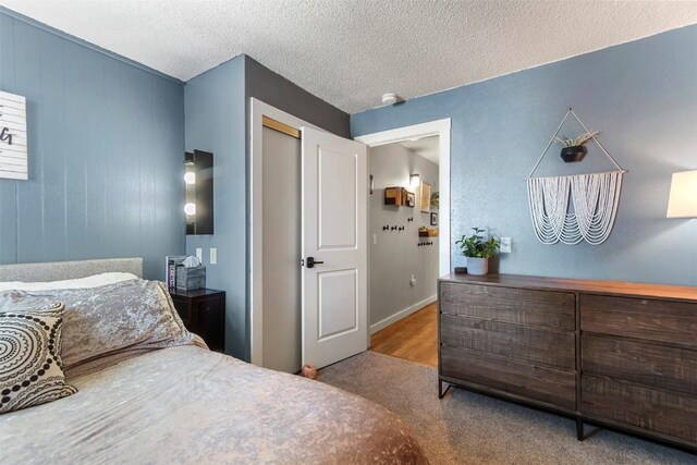 1127 Ski Hill Rd Unit 106, Breckenridge, CO 80424 - bedroom with a textured ceiling