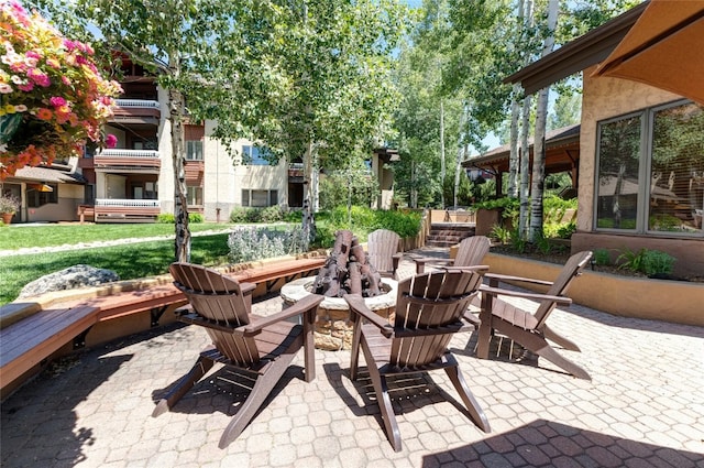 1800 Medicine Springs Dr Unit 5303, Steamboat Springs, CO 80487 - view of patio / terrace featuring an outdoor fire pit