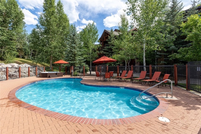 1800 Medicine Springs Dr Unit 5303, Steamboat Springs, CO 80487 - view of pool featuring a hot tub and a patio area