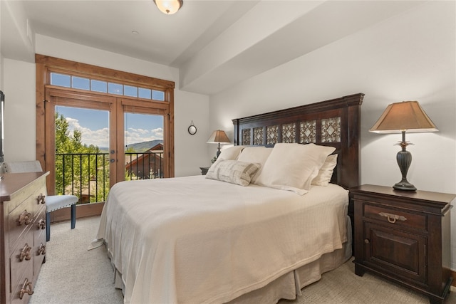 1800 Medicine Springs Dr Unit 5303, Steamboat Springs, CO 80487 - bedroom featuring access to outside and light colored carpet