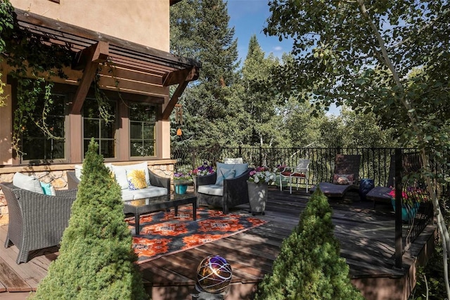 2415 Val Disere Cir, Steamboat Springs, CO 80487 - wooden deck with an outdoor hangout area and a pergola