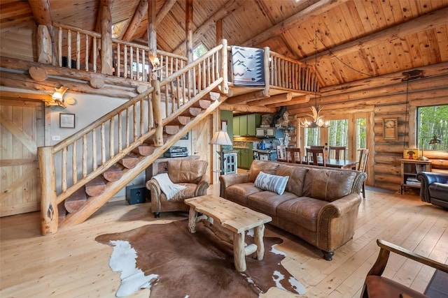 633 French Pass Cir, Jefferson, CO 80456 - living room with a wooden ceiling with exposed beams, high vaulted ceiling, rustic walls, wood-type flooring, and a chandelier