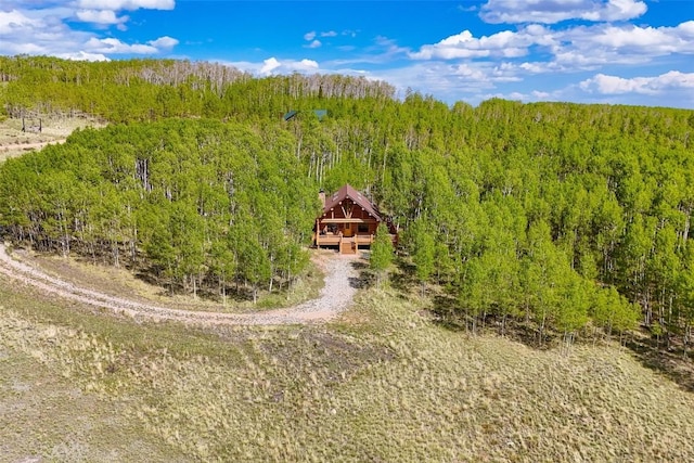 633 French Pass Cir, Jefferson, CO 80456 - aerial view of property and surrounding area featuring a heavily wooded area