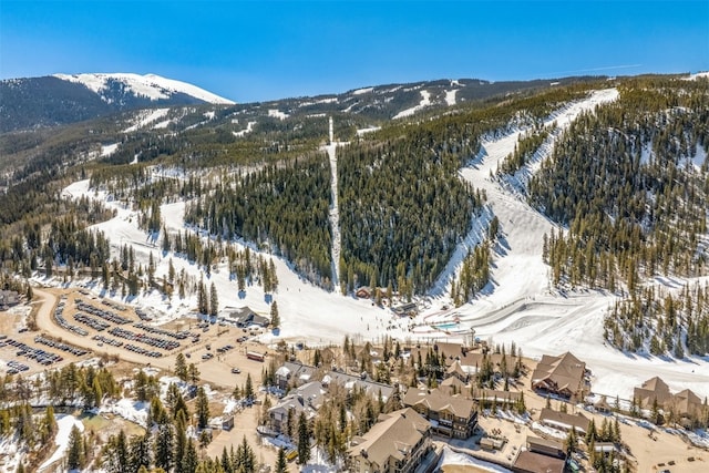 1203 W Keystone Rd Unit 2709, Keystone, CO 80435 - snowy aerial view featuring a forest view and a mountain view