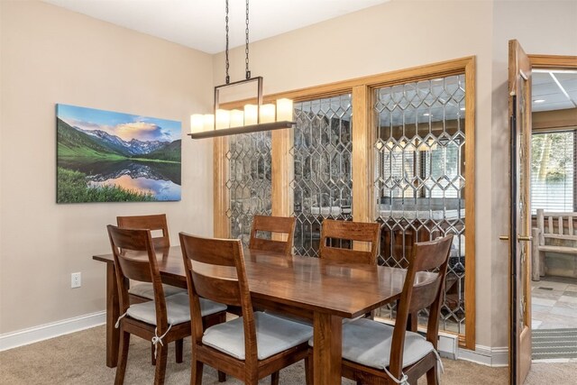 1203 W Keystone Rd Unit 2709, Keystone, CO 80435 - dining room featuring baseboards and carpet flooring