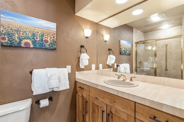 1203 W Keystone Rd Unit 2709, Keystone, CO 80435 - bathroom featuring vanity, toilet, and a stall shower