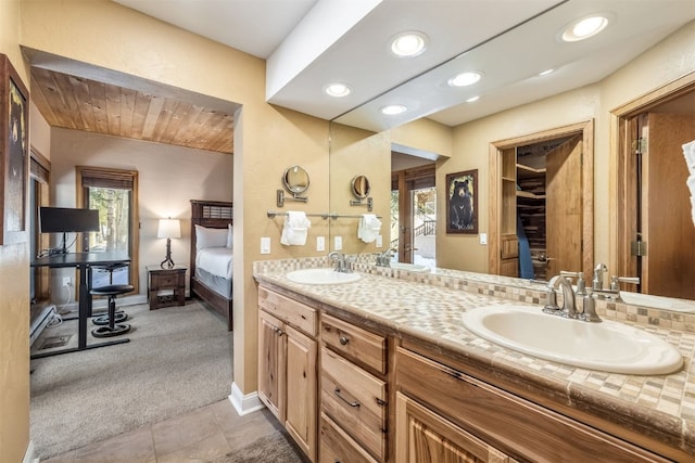 1203 W Keystone Rd Unit 2709, Keystone, CO 80435 - bathroom featuring double vanity, a wealth of natural light, and a sink