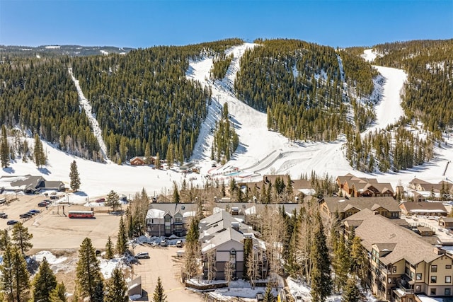 1203 W Keystone Rd Unit 2709, Keystone, CO 80435 - snowy aerial view with a forest view, a mountain view, and a residential view