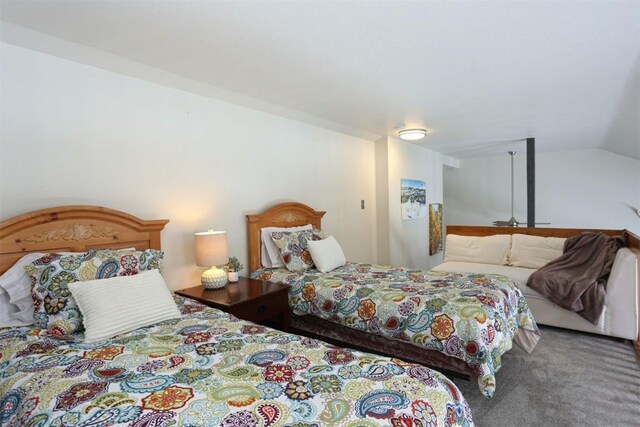 9876 Ryan Gulch Rd Unit F303, Silverthorne, CO 80498 - bedroom with vaulted ceiling and carpet