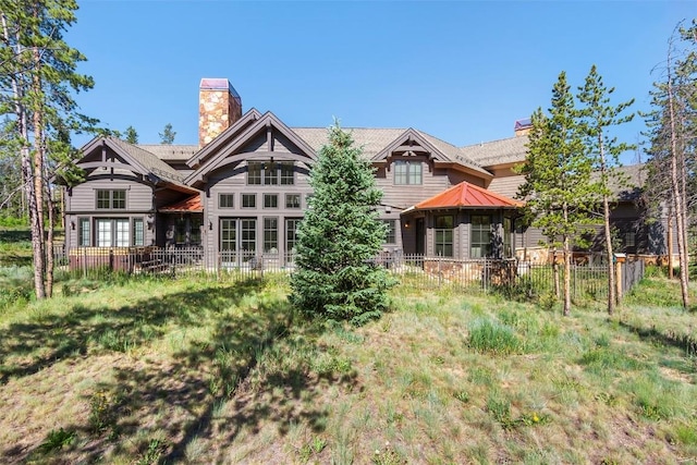 228 Cottonwood Cir, Breckenridge, CO 80424 - back of property featuring a chimney