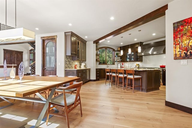 228 Cottonwood Cir, Breckenridge, CO 80424 - dining room with light wood-style flooring, recessed lighting, and beam ceiling