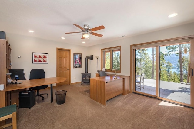 440 Gcr 466, Grand Lake, CO 80447 - home office with a wood stove, light carpet, recessed lighting, ceiling fan, and baseboards