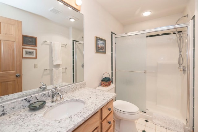 440 Gcr 466, Grand Lake, CO 80447 - bathroom featuring a shower stall, toilet, vanity, and tile patterned flooring
