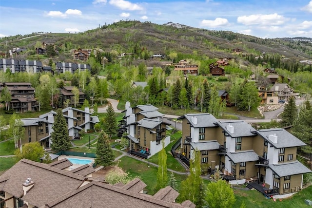 2515 Apres Ski Way Unit 5, Steamboat Springs, CO 80487 - aerial view of residential area with a mountainous background and a pool
