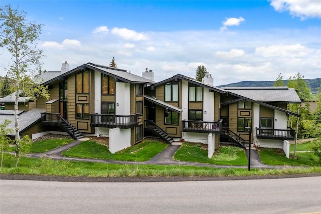 2515 Apres Ski Way Unit 5, Steamboat Springs, CO 80487 - view of front of property with stairway and a chimney